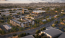 aerial of property showing nearby parking and nearness to a local community